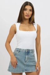 White Sleeveless Top With Trims And Bow